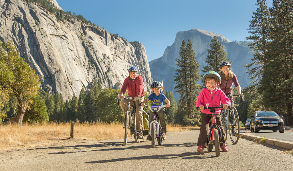 Family biking together in Yosemite Valley
