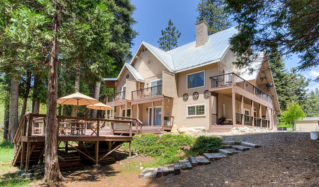 Exterior view of Big Creek Inn with deck.