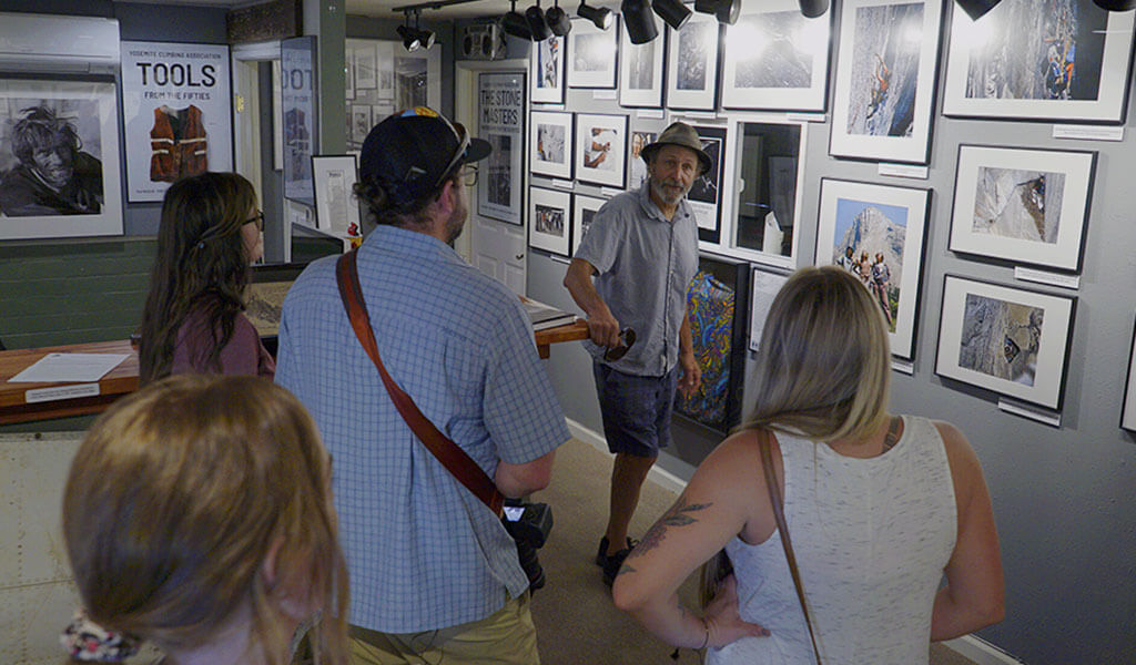 Ken Yager introduces a group to Yosemite Climbing History in the Yosemite Climbing Museum