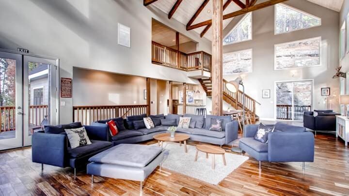 living room with vaulted ceilings and beams