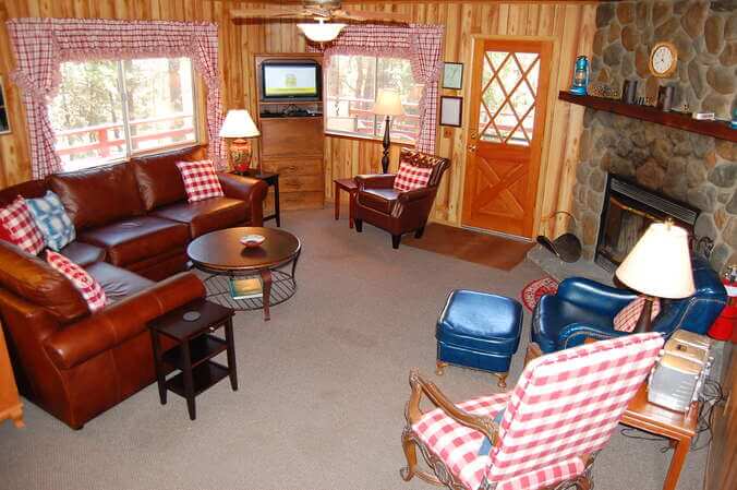 living room with fireplace and seating