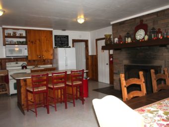 kitchen and dining area with fireplace