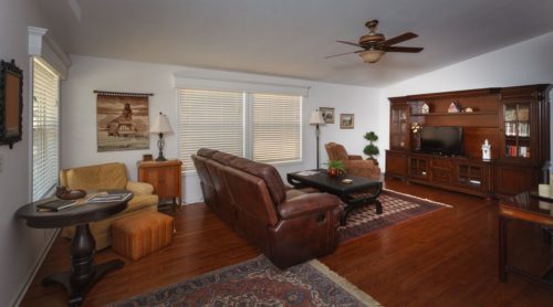 living room with couch and fireplace