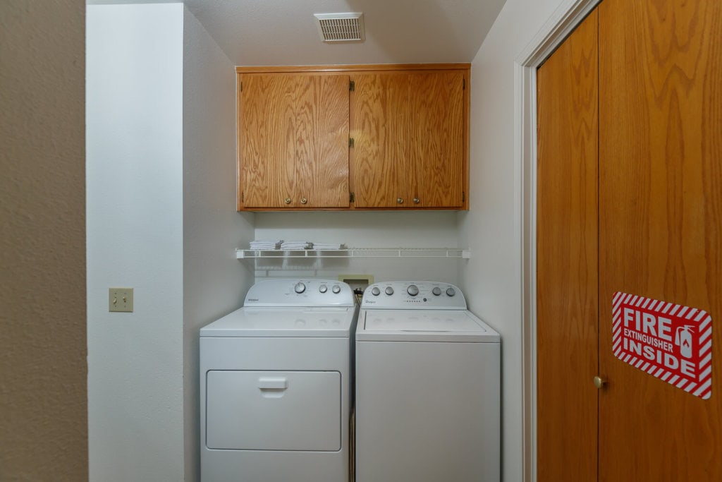 laundry room with washer and dryer