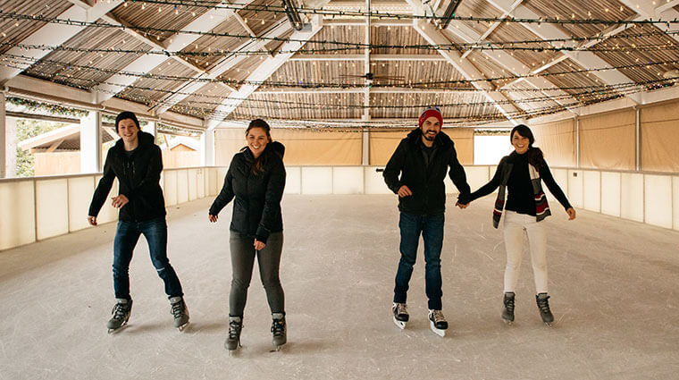 4 people ice skating at Tenaya at Yosemite