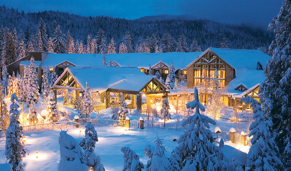 The main lodge at Tenaya at Yosemite glows on a winter evening