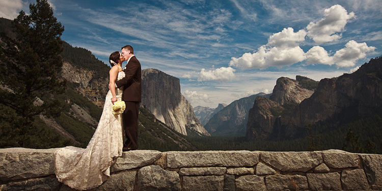 Wedding couple kissing at Tunnel View