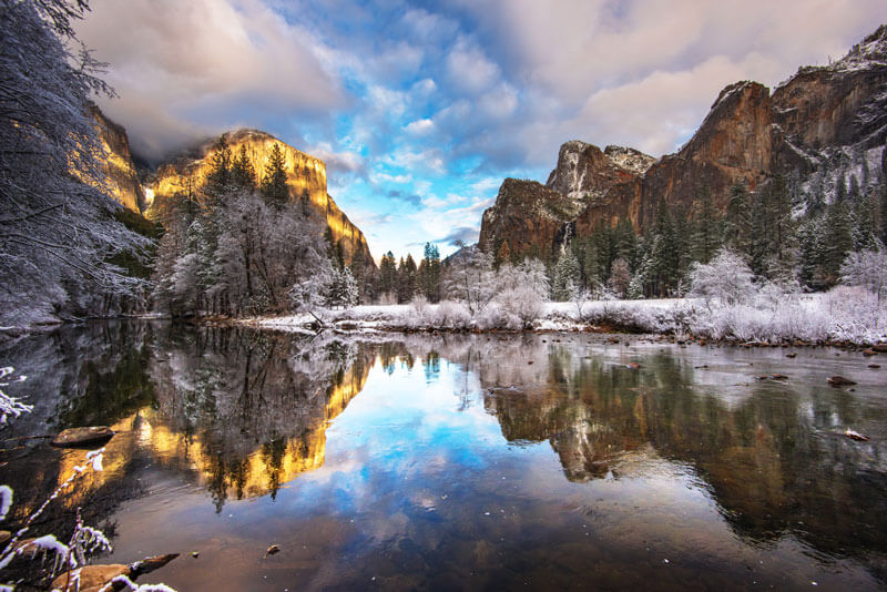 Clouds add drama to a winter scene from Valley View in Yosemite Valley.
