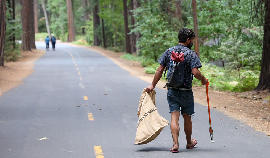 Man collecting trash during the Yosemite Facelift