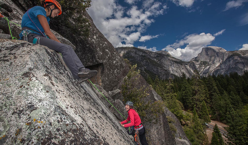 Yosemite Mountaineering School climbing guide and her client