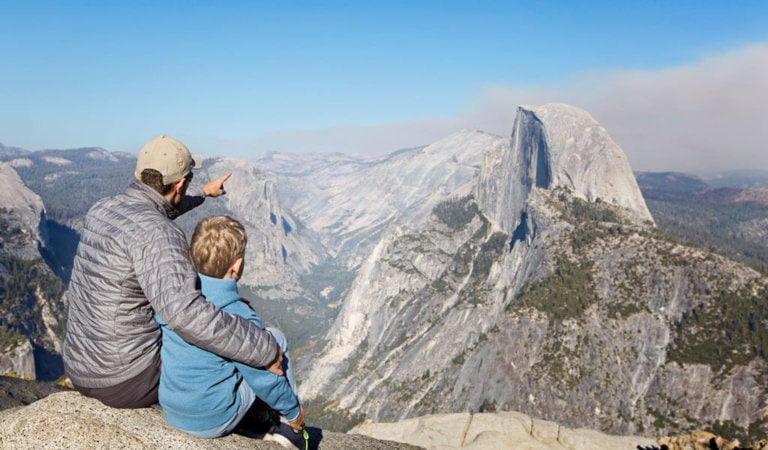 father points out half dome to kid