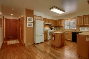 kitchen with wood cabinets and floors