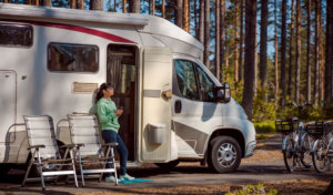 Woman enjoying an RV campsite