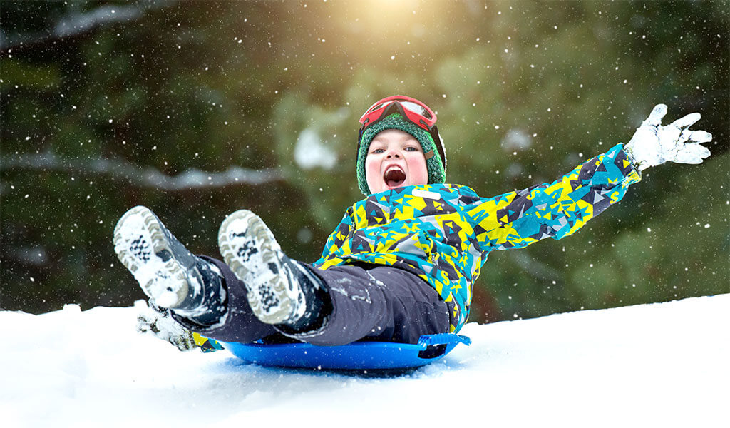 kid sledding