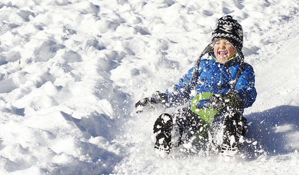 Kid sledding