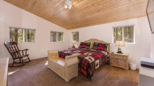 bedroom with wood ceiling