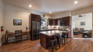 fully equipped kitchen with bar seating