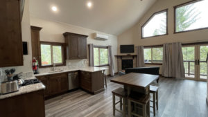 kitchen, dinging and view of living area