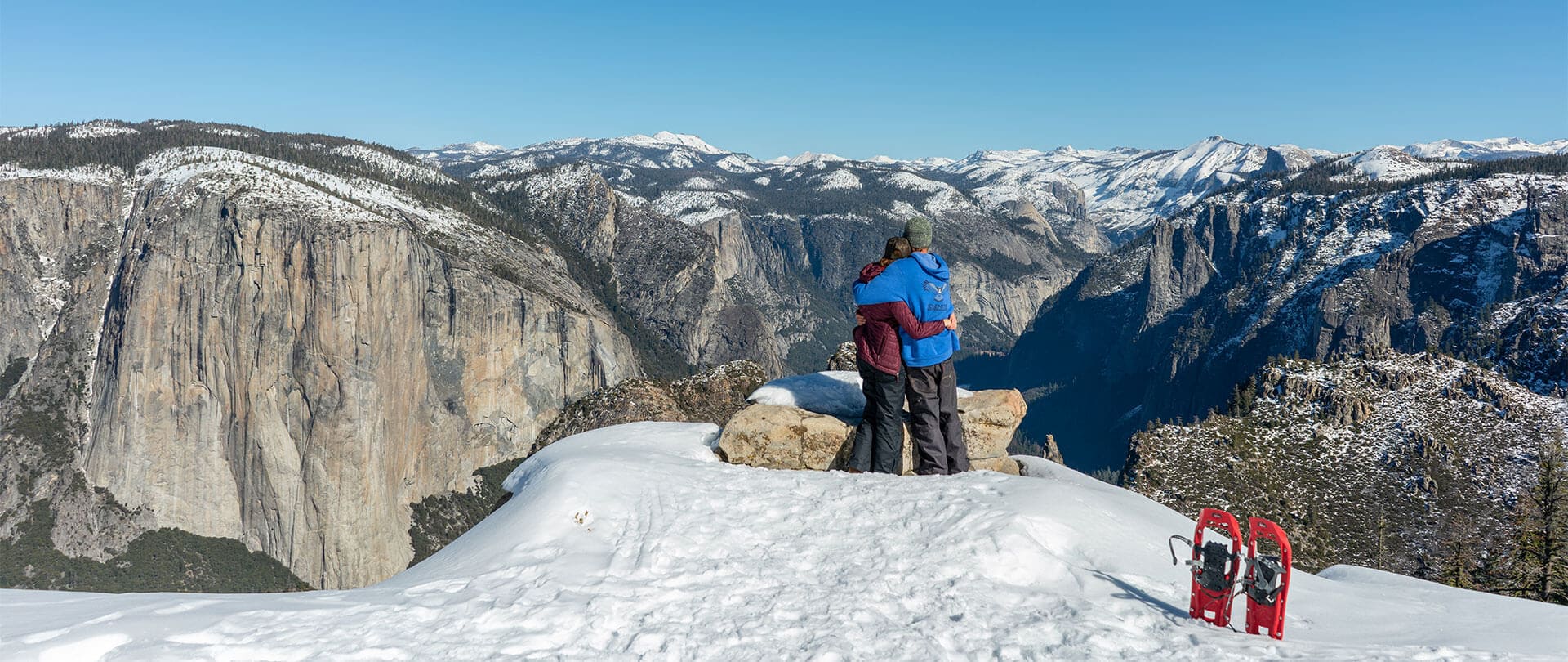 Couple snowshoe to Dewey Point