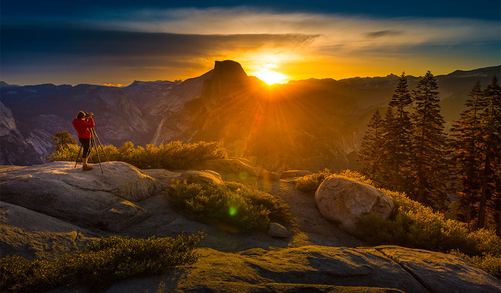 Photographer at Washburn Point for sunrise