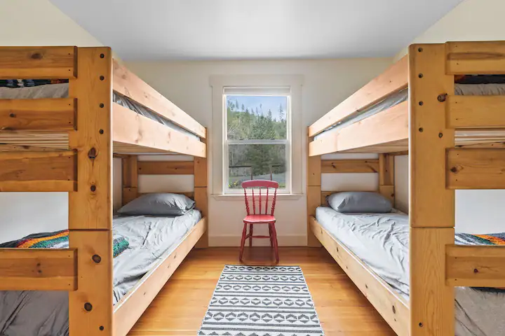 bedroom with two sets of bunk beds