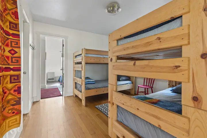 bedroom with two sets of bunk beds