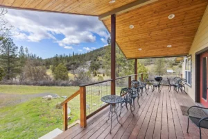 large covered deck with outdoor seating