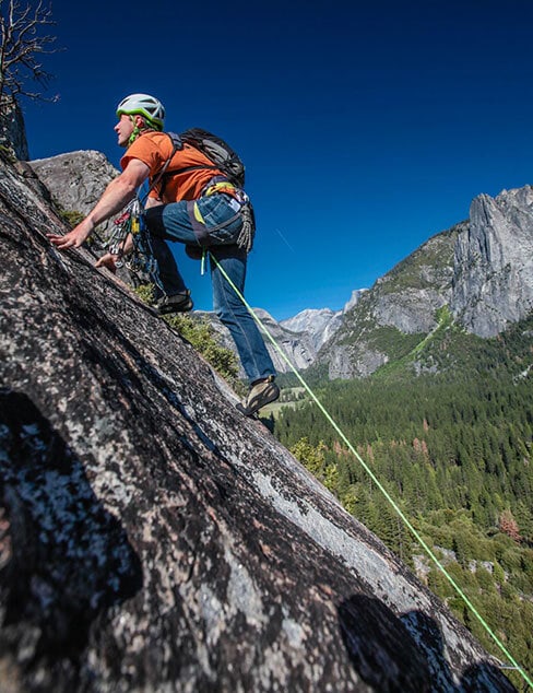 rock climber above Yosemite Valley