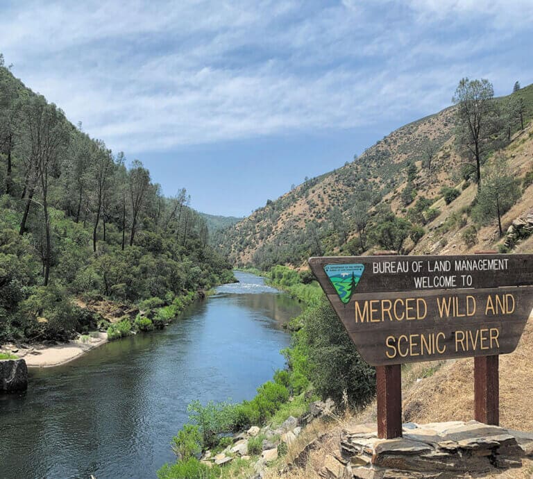 Merced Wild and Scenic River Sign by the river