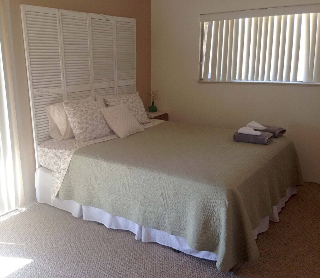 one bedroom with window and bed