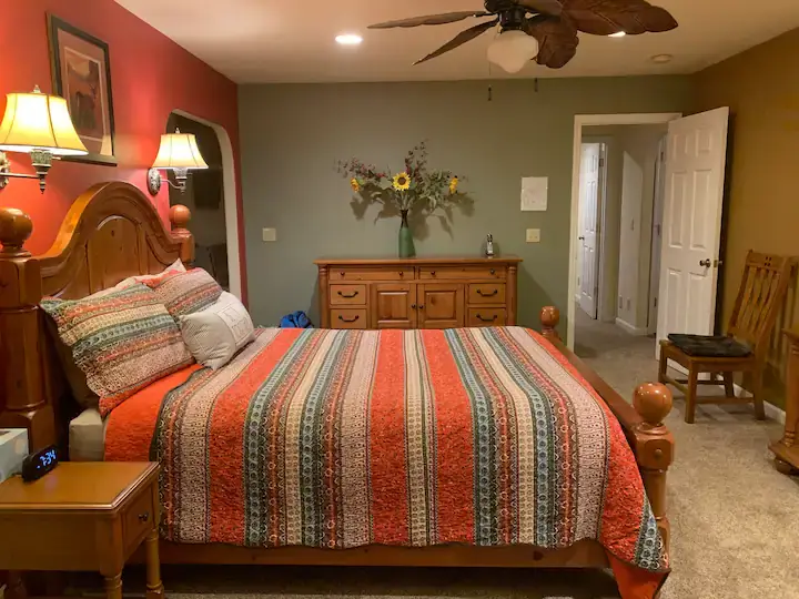 bed with striped bedding