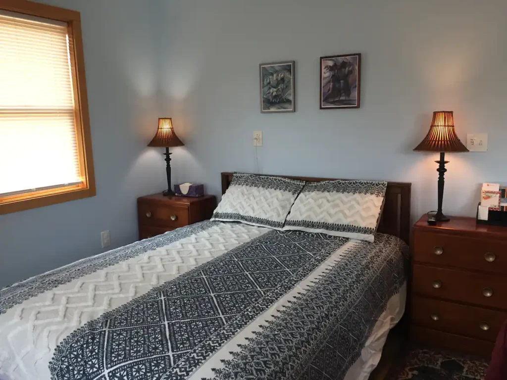 bed with nightstands and lamps