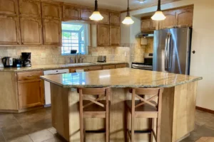 kitchen with light cabinets and island