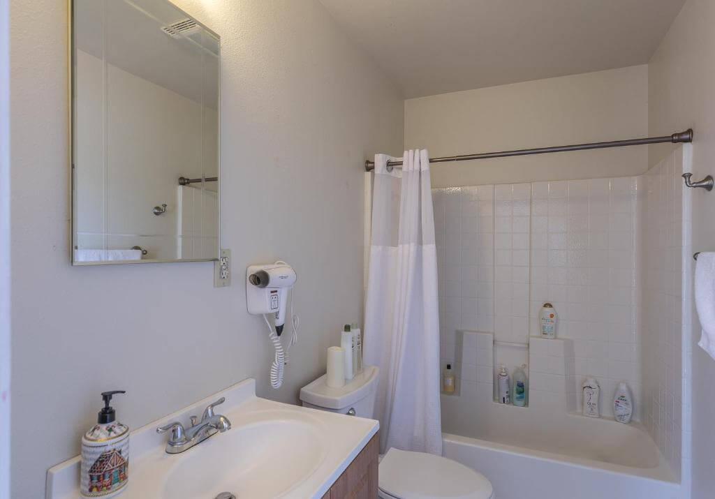 bathroom with bath tub and shower