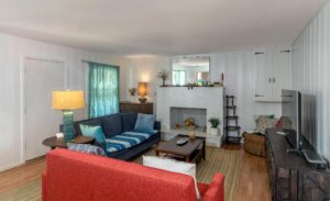 living room with fireplace and couches