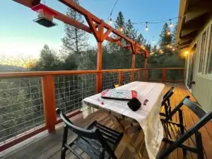 deck with outdoor dining