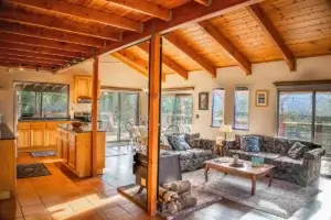 living room with vaulted ceiling