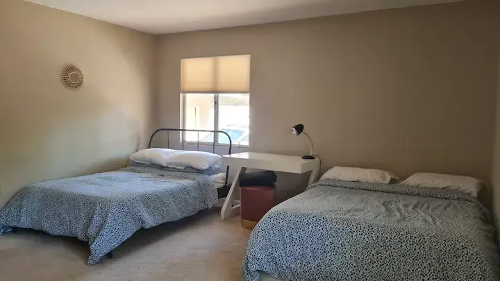 bedroom with two full beds