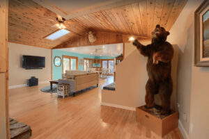 view into living room with stuffed bear