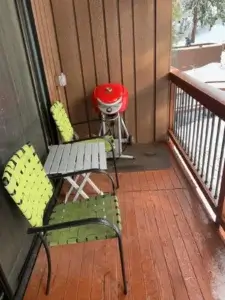 balcony with outdoor seating and grill