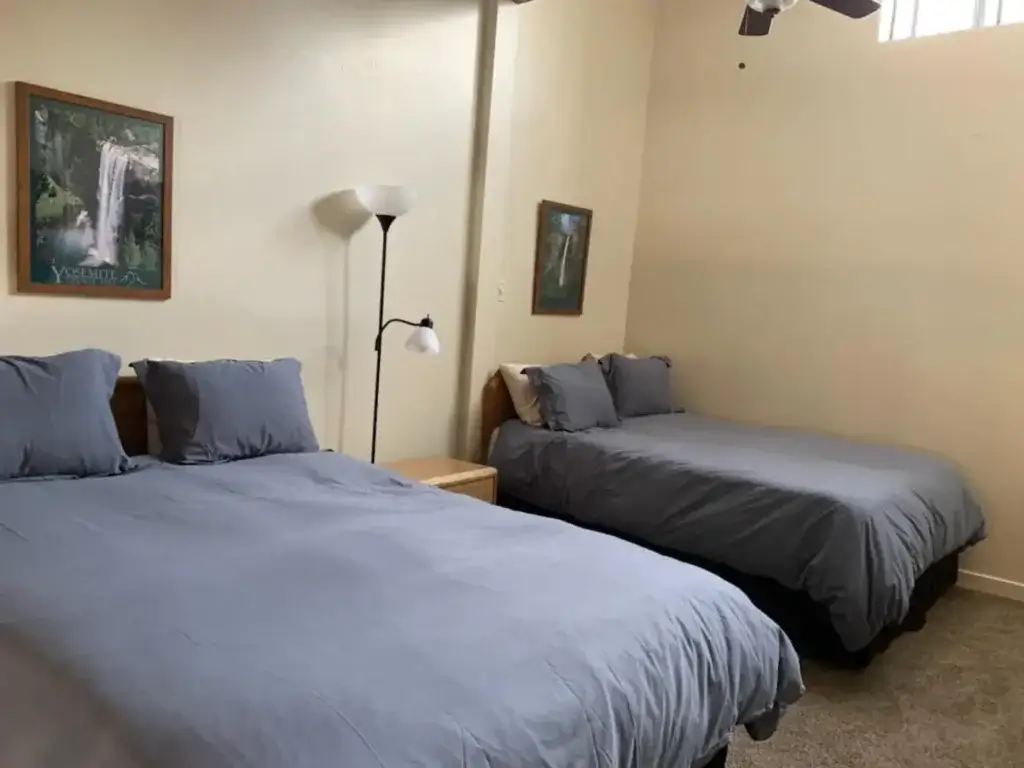 loft bedroom with two queen beds