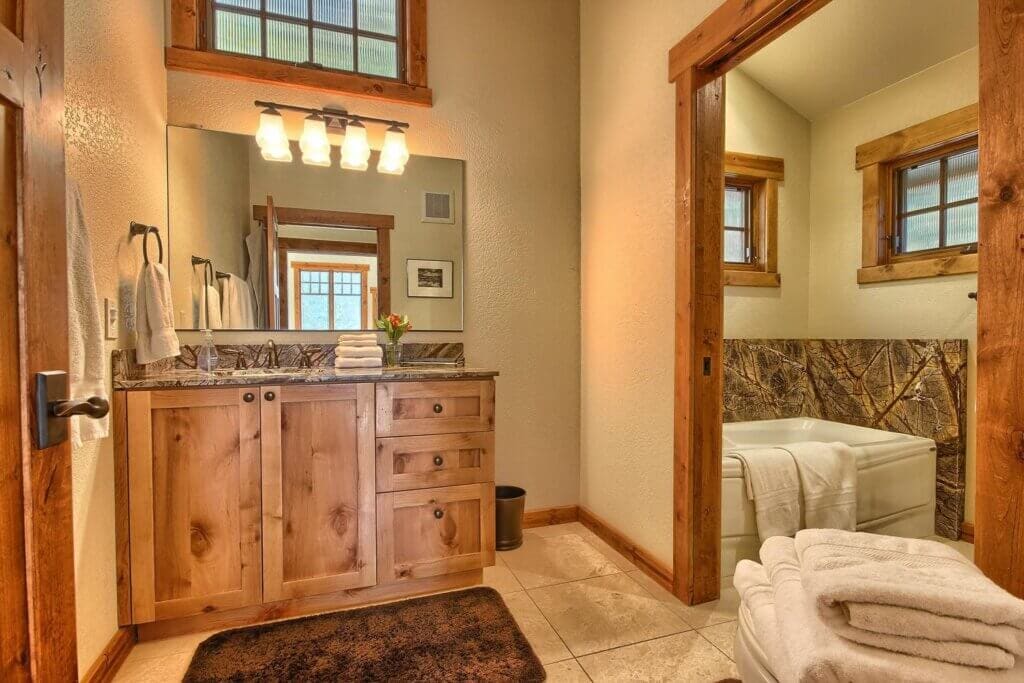 bathroom vanity and bathtub