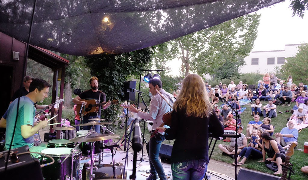 Local band gives a concert at Music on the Green in Mariposa