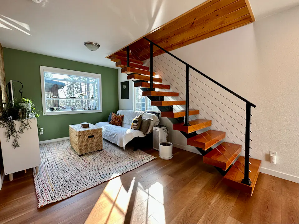 living rom under stairs to bedroom