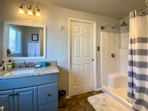 bathroom with walk in shower