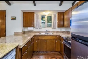 u shaped kitchen with wood cabinets