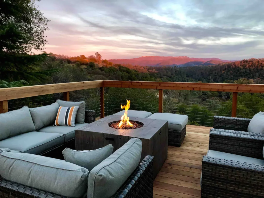 deck with outdoor seating and fire pit