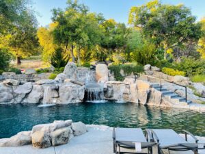 river rock pool with waterfall