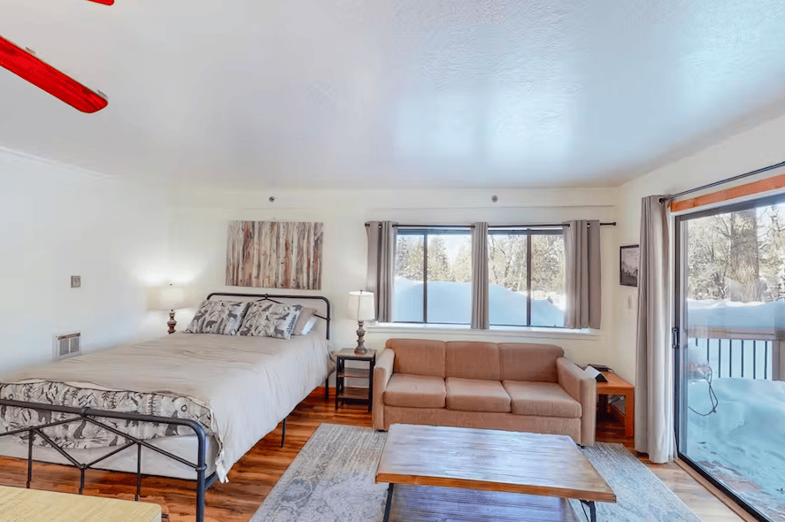 view of bed and couch