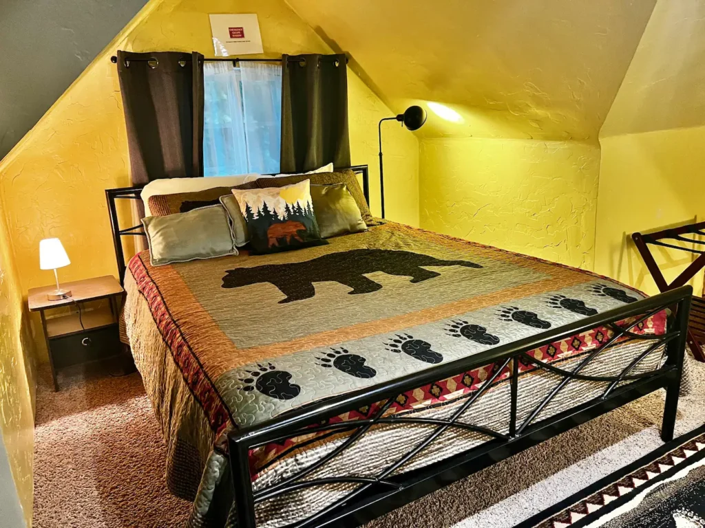loft primary bedroom with queen bed